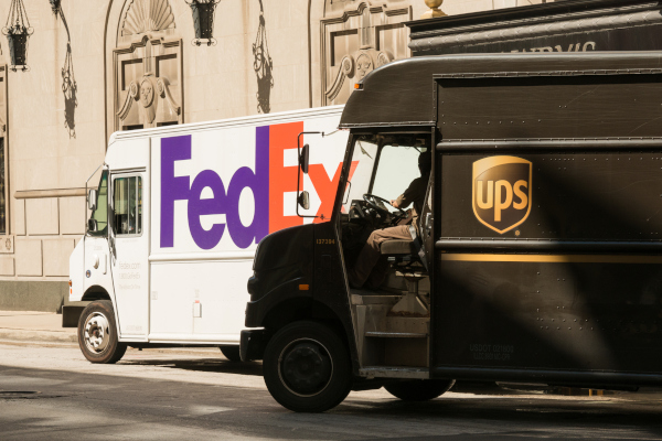UPS joined FedEx in announcing it will extend demand surcharges to packages effective Jan. 14.